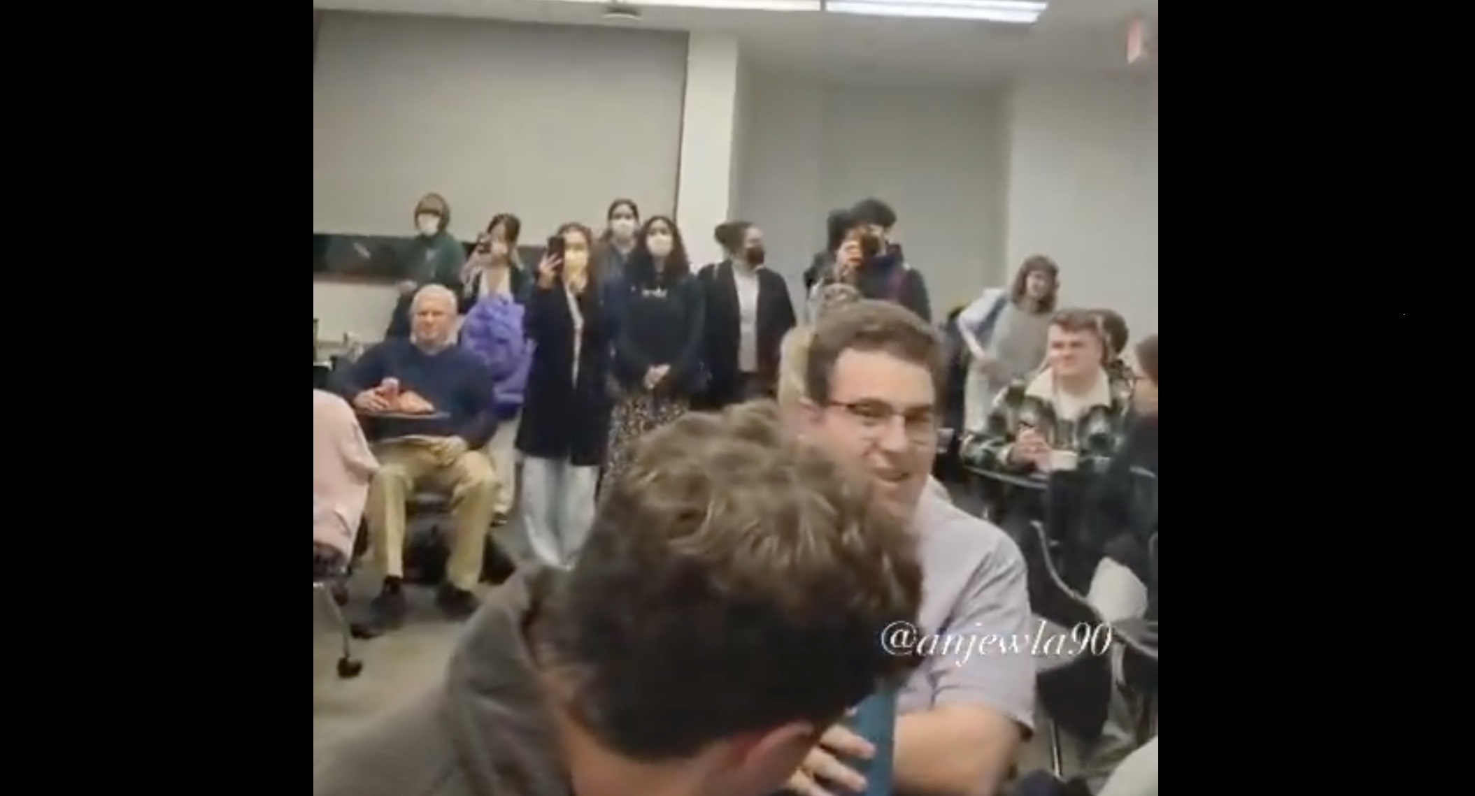 Masked protesters disrupt a University of Michigan lecture by SFSU professor Marc Dollinger (not pictured) on Nov. 19 about the alliance between Black and Jewish communities during the Civil Rights Movement. (X/@anjewla90)